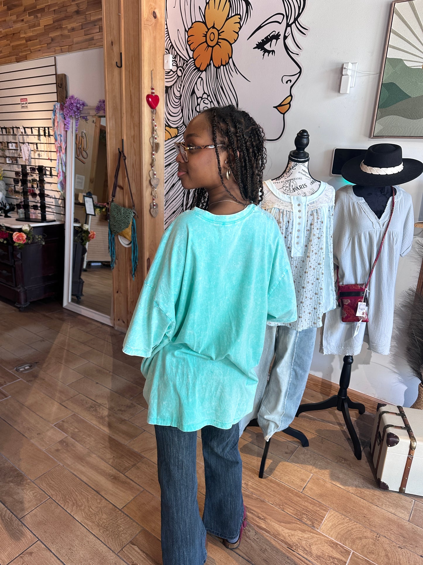 Model wearing turquoise cotton Zenana t-shirt in S/M side back view at Gypsy Spirit Boutique