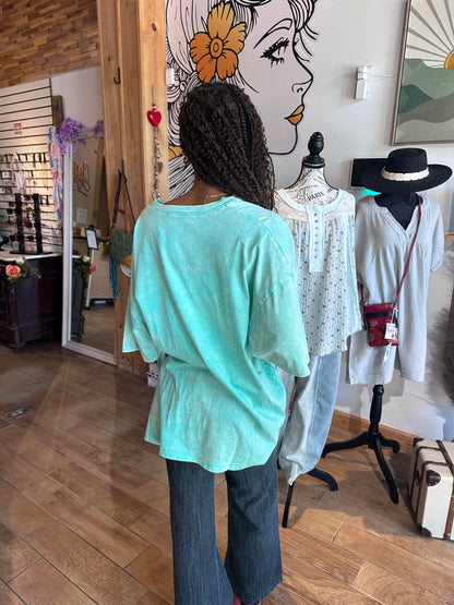 Model wearing turquoise cotton Zenana t-shirt in S/M back view at Gypsy Spirit Boutique