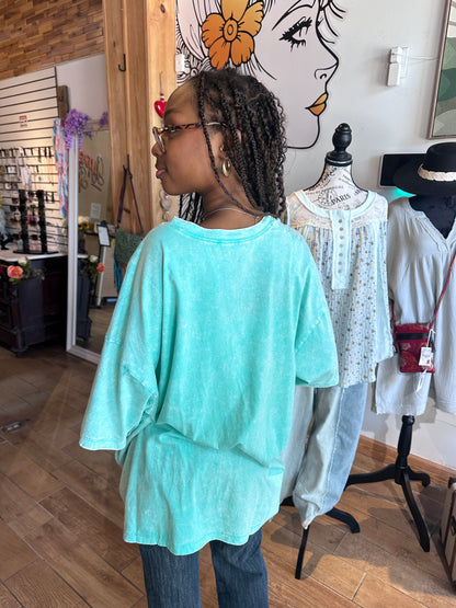 Model wearing turquoise cotton Zenana t-shirt in S/M side back view at Gypsy Spirit  Boutique Zoom