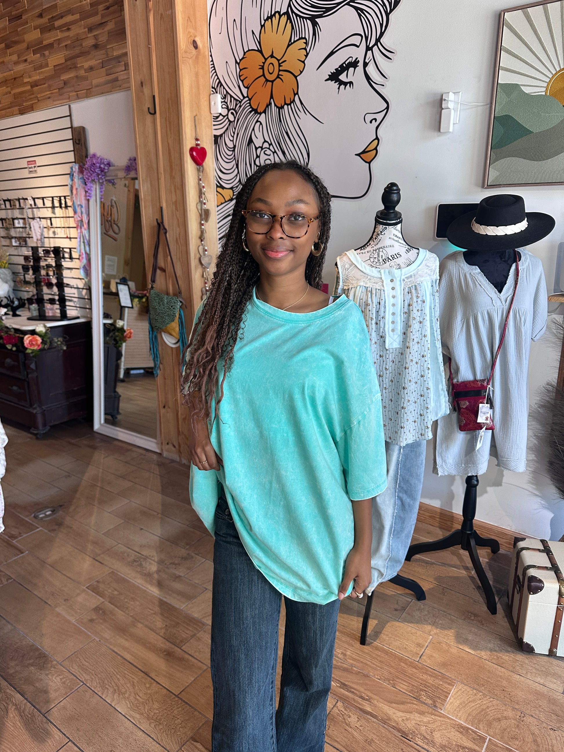 Model wearing turquoise cotton Zenana t-shirt in S/M front tucked view at Gypsy Spirit Boutique 2