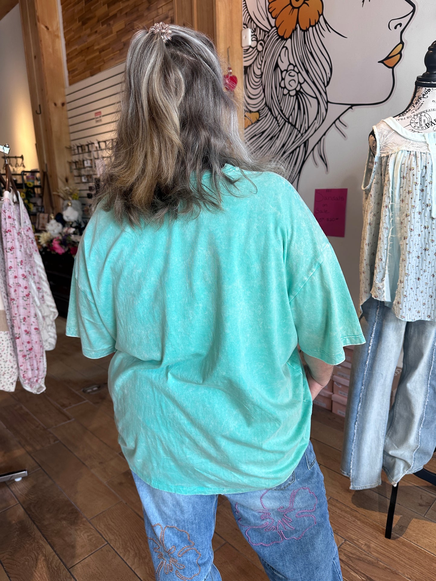 Col wearing turquoise cotton Zenana t-shirt in L/XL back view at Gypsy Spirit Boutique