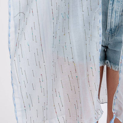 COLORED STITCH TRIM AND TASSEL KIMONO.
